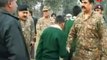 Defying threats: Army chief meets APS students as they return to school