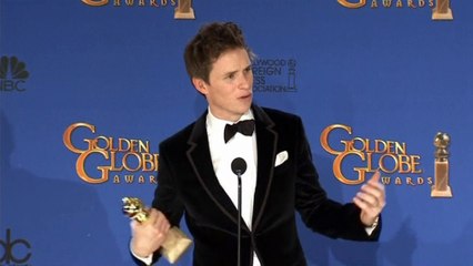 Eddie Redmayne and George Clooney in Globes winners' room