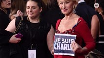 Celebs Show Support For Charlie Hebdo At Golden Globes