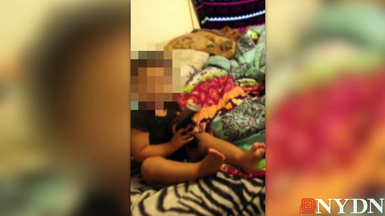 Raw: Baby with gun in mouth video gets couple busted