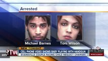 Couple Arrested After Video Surfaces Of Baby Playing With Gun