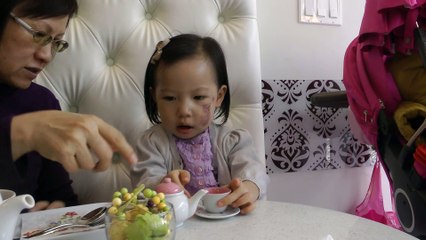 Girl Having Afternoon Tea