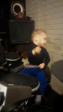 2-year-old rockstar kid plays drums on the pretender by Foo Fighters