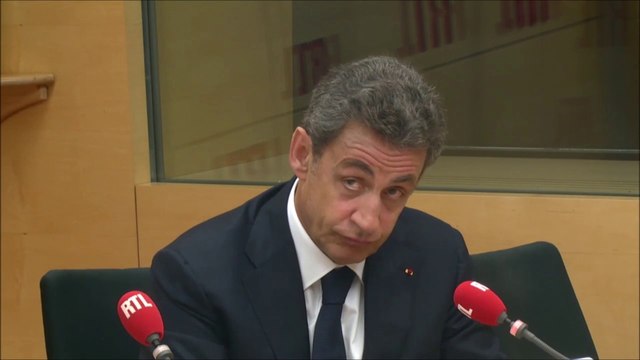 Sarkozy grimace face à une auditrice convertie à l'Islam
