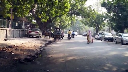 Indian Girls Beating a Boy on the Road