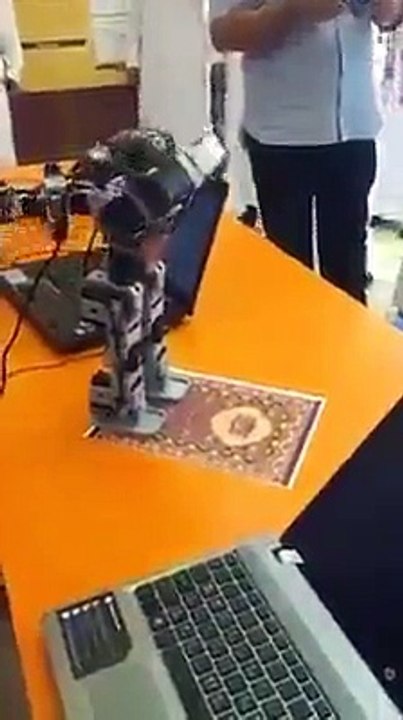 Robot is praying very interesting.