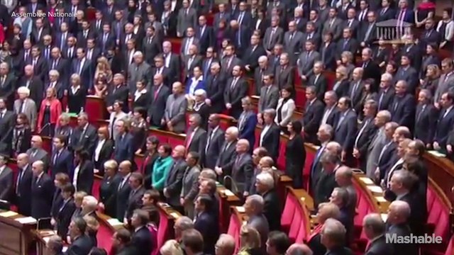 After moment of silence, politicians sing French national anthem to honor attack victims