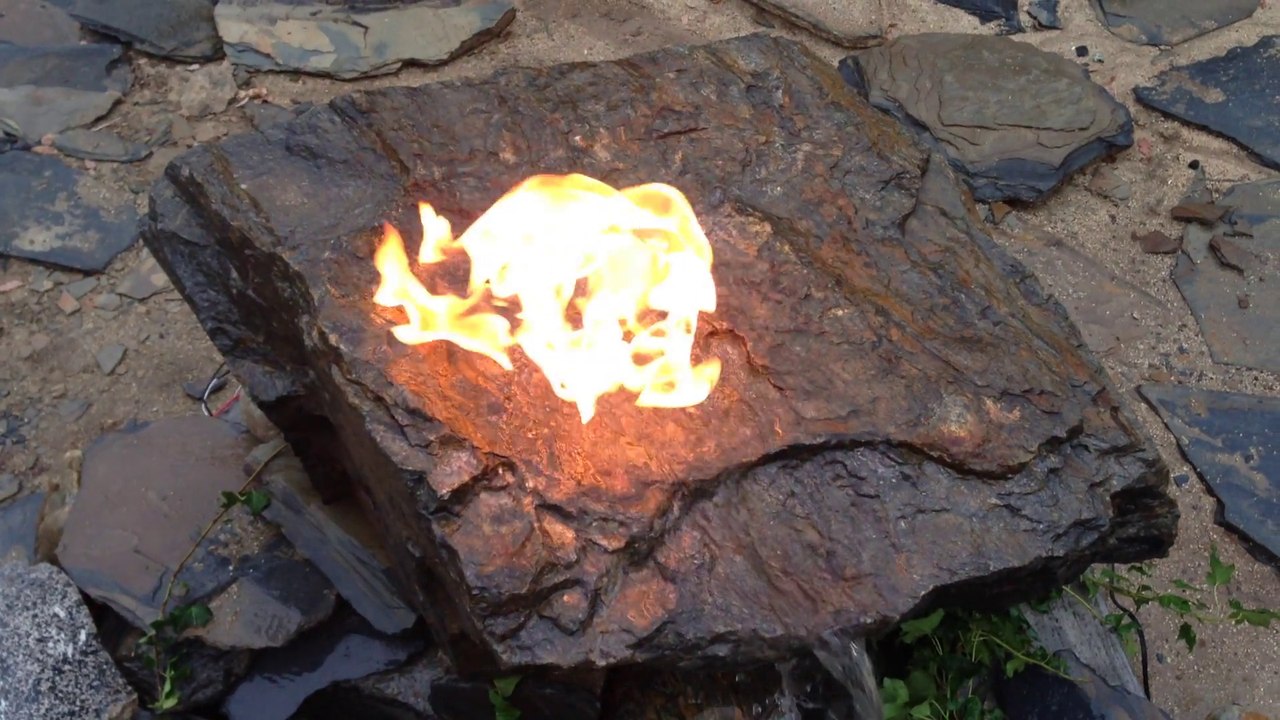 Relaxing calm top of stone water flame: fire pit water fall video www.flamestonefountain.com