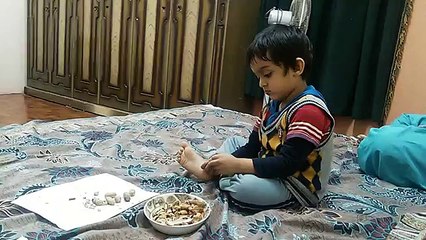 Haider eating peanut - YouTube2