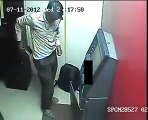 Watch How Cleverly this thief is taking out Money from ATM