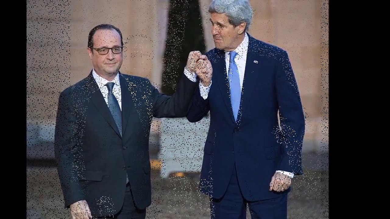 John Kerry awkwardly hugs and kisses French President Francois Hollande
