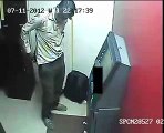 Watch How Cleverly this thief is taking out Money from ATM