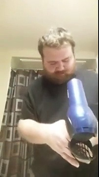blowdrying my beard