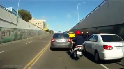 Funny Videos_ Stupid motorbiker tried overtake and fell _