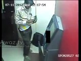Watch How Cleverly this thief is taking out Money from ATM
