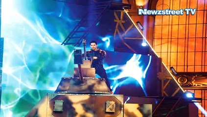 Varun Dhawan falls from tank during a stage performance