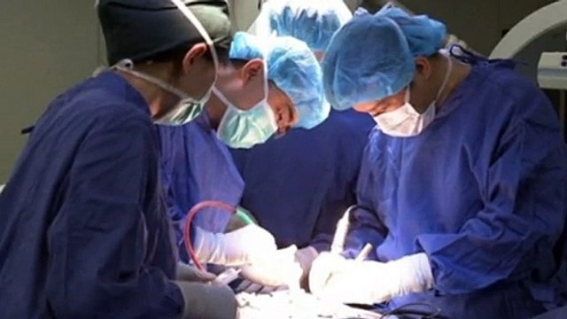 Doctors in China carry out world first spine surgery
