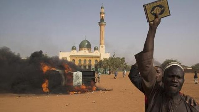 Violent protests over Charlie Hebdo cartoon