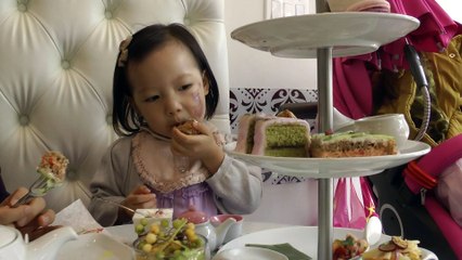Girl Having Afternoon Tea