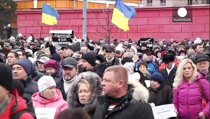 Ukrainians remember 13 killed in Volnovakha