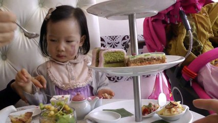 Girl Having Afternoon Tea