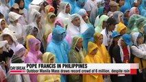 Despite rain, Pope Francis draws record crowd of 6 million in Manila outdoor Mass