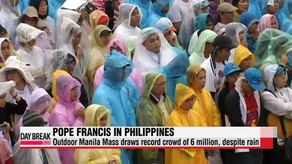 Despite rain, Pope Francis draws record crowd of 6 million in Manila outdoor Mass