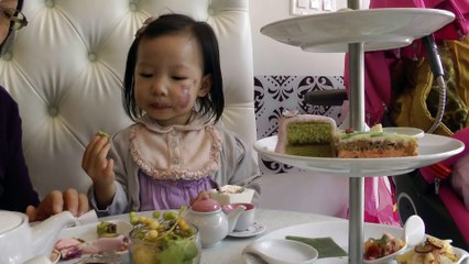 Girl Having Afternoon Tea*