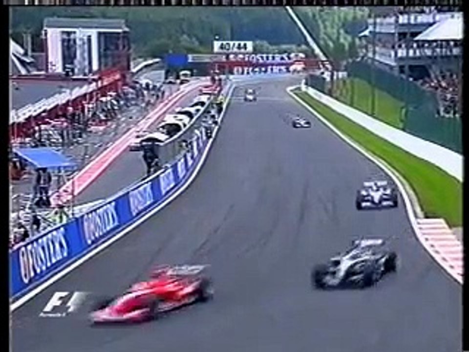 Kimi Räikkönen overtaking Michael Schumacher in Eau Rouge Spa 2004