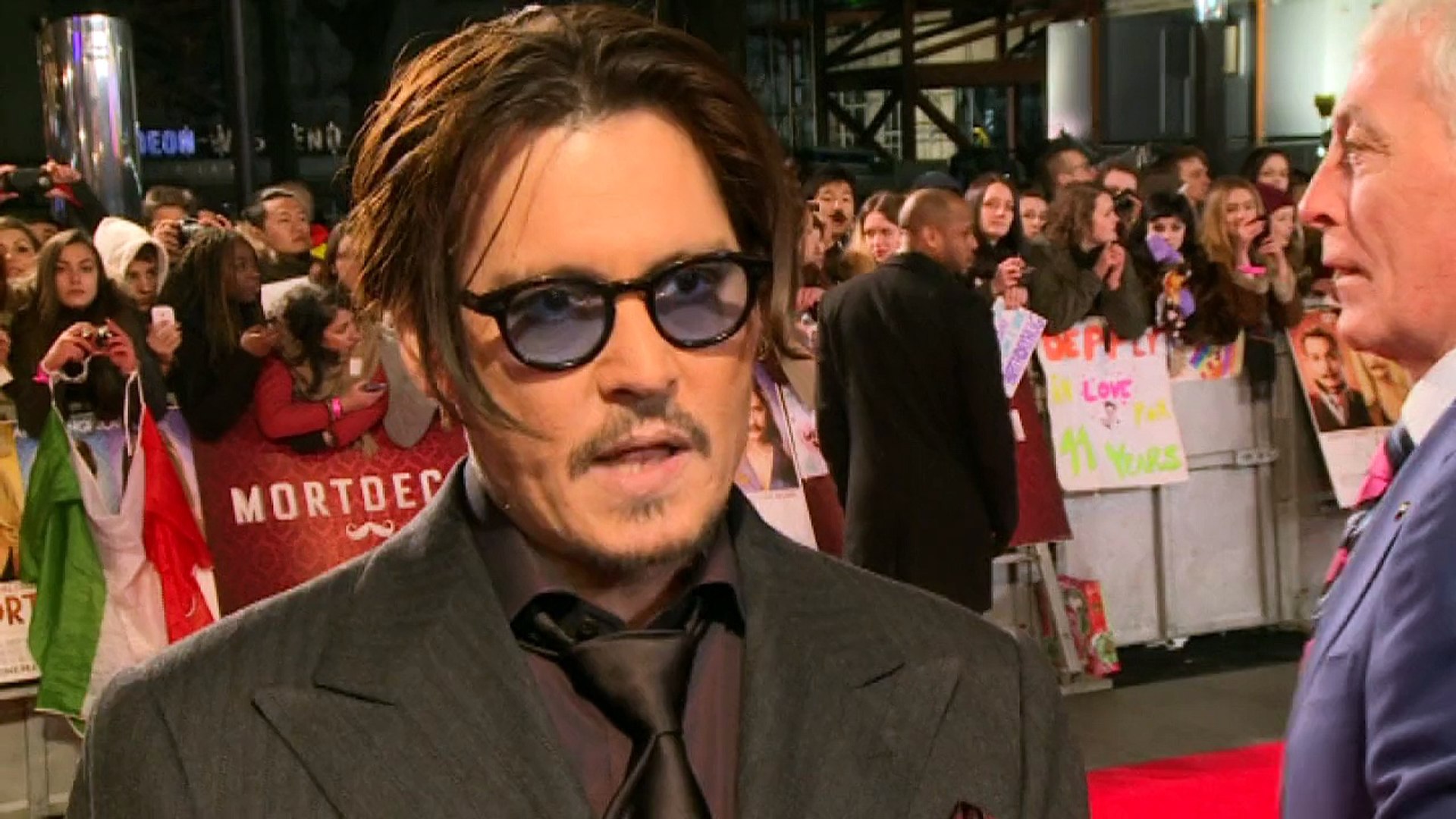 Johnny Depp on his Mortdecai moustache and Amber Heard