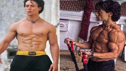Tiger Shroff Shows Off His 8 Pack Body.mp4