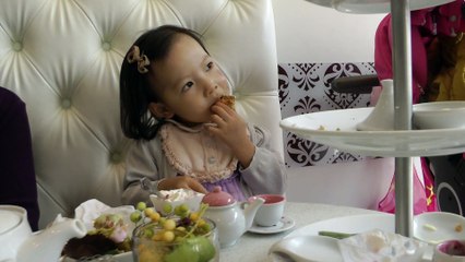 Girl Having Afternoon Tea
