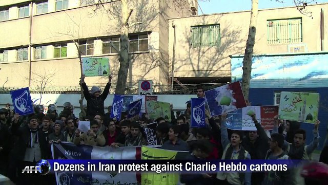Iranian students protest outside the French embassy in Tehran