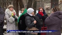 Father buries 4-year-old son, curses Ukraine's war