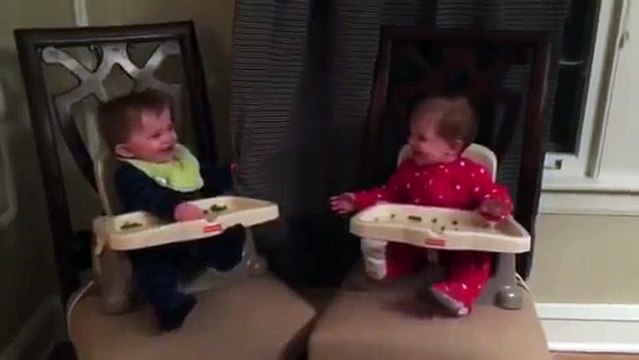 Adorable twins playing Peekaboo