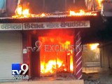 Tv9 EXCLUSIVE:  IT officials conduct raid, shop blaze leaves owner injured, Amreli - Tv9 Gujarati