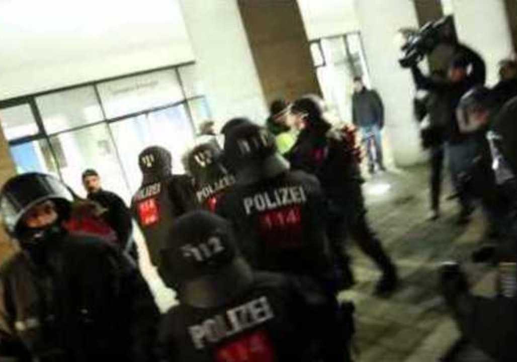 Man With Rainbow Flag Confronts PEGIDA Demonstrators