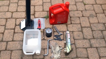 Comment faire une vidange d'huile sur une Peugeot 205 ?