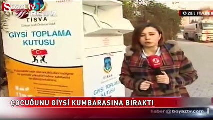 Çocuğunu giysi kumbarasına bırakan anne