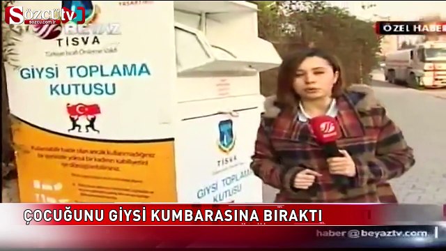 Çocuğunu giysi kumbarasına bırakan anne