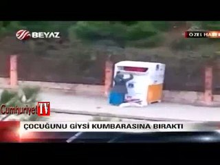 Çocuğunu giysi kumbarasına bırakan anne