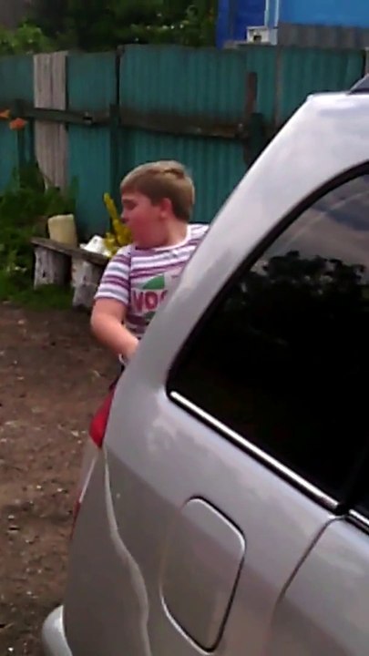 Fat kid scared by tiny puppy is just hilarious!