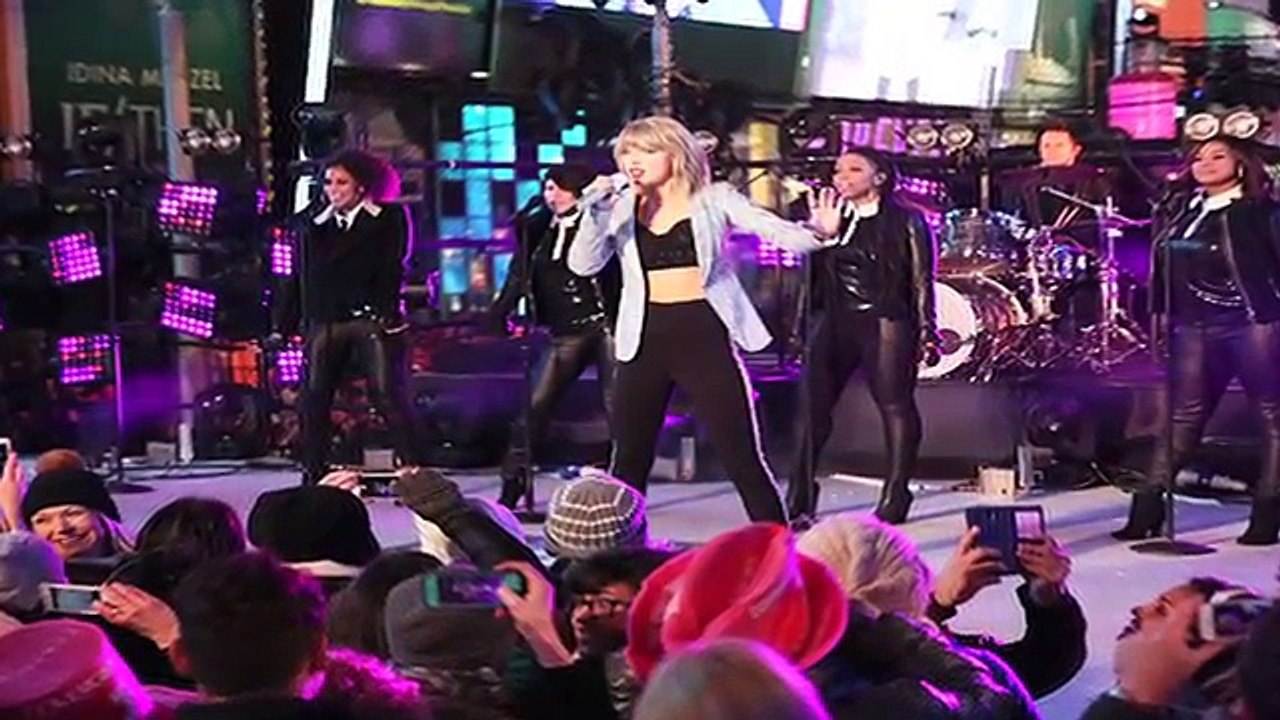 Taylor Swift Nearly Falls Down Stairs After NYE Performance!