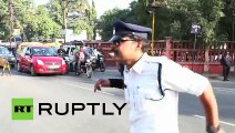 Moonwalking Cop-- Indian Traffic Police Directs Traffic With Style