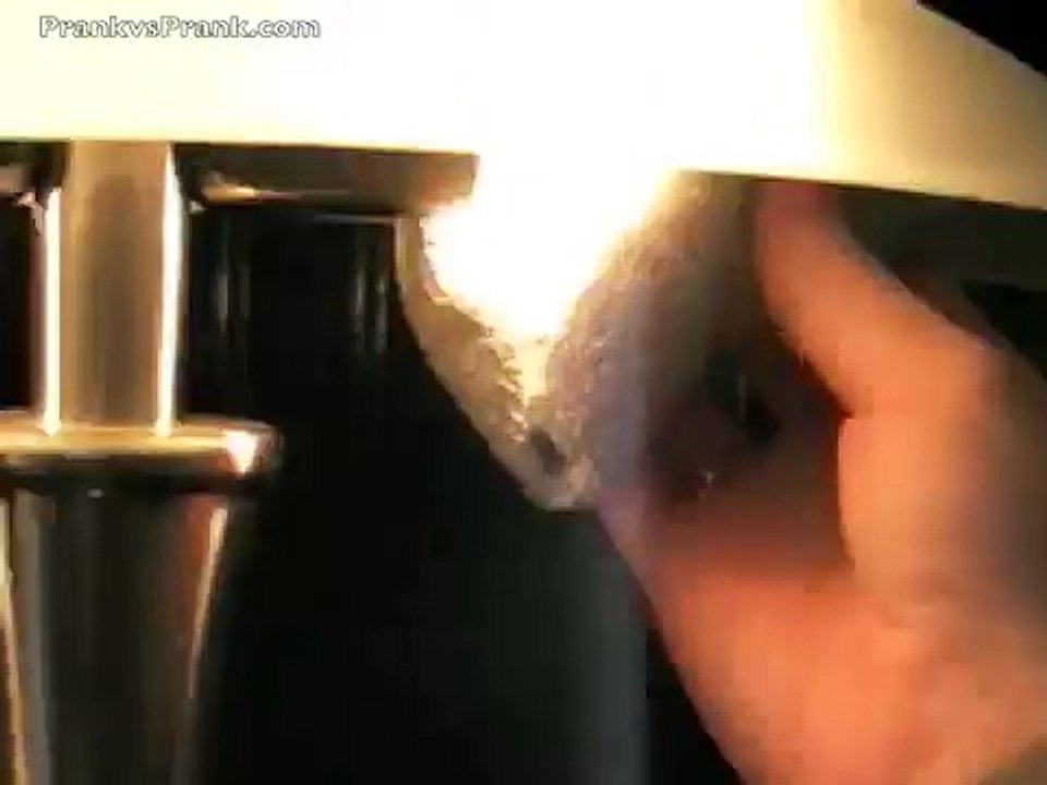 Girlfriend Pranks Boyfriend with hot light bulb