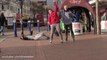 Funny guys performing Public WWE Finishers in the street!
