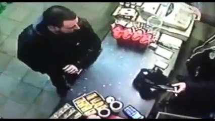 Incredible Moment Shopkeeper Snatches Gun Out of Thief's Hand