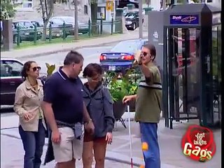 Blind man kicking oranges