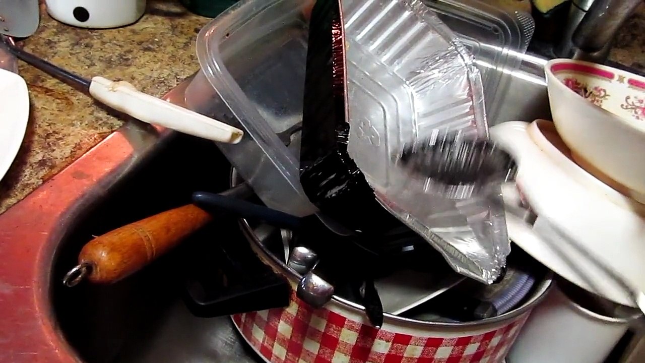 heating up and melting a pie plate on the stove for pure entertainment and amusement