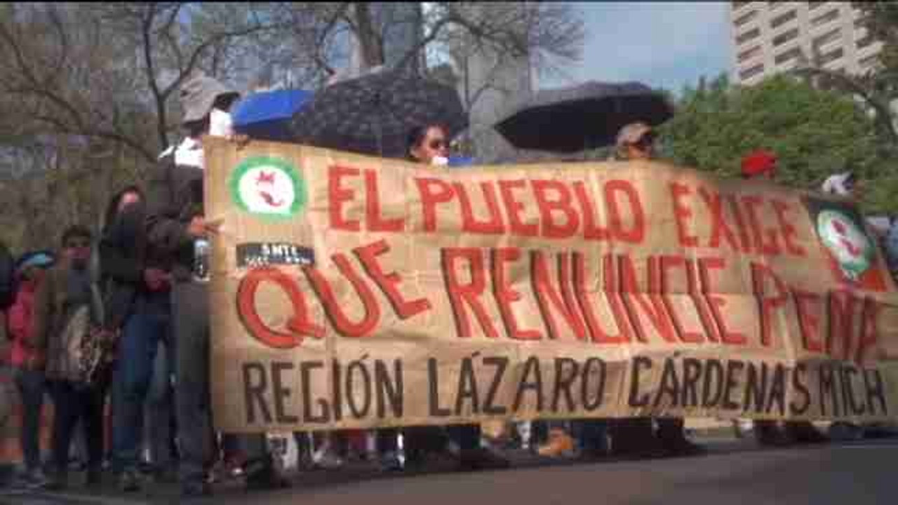 Thousands march to remember 43 missing students